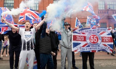 Hundreds of Rangers fans celebrate at Ibrox with huge crowds and smoke bombs
