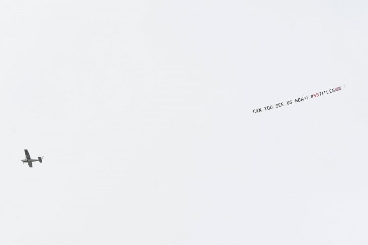 Rangers fans taunt Celtic with aeroplane banner flown above Tannadice