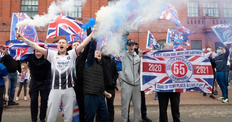 Hundreds of Rangers fans celebrate at Ibrox with huge crowds and smoke bombs