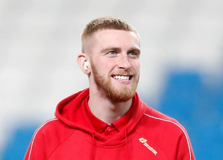 Rangers-daft Oli McBurnie wears commemorative gold Castore jersey to celebrate Premiership title win